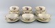 9 Royal Copenhagen Frijsenborg bouillon cups with saucers in hand-painted 
porcelain with flowers and gold edge. 1950s.
