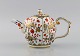 Antique Meissen teapot in hand-painted porcelain with red flowers and gold 
decoration. 19th century. Museum quality.
