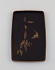 Japanese lacquer tray in exotic wood with hand-painted butterfly, foliage and 
gold edge. Early 20th century.

