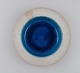 Nils Kähler (1906-1979) for Kähler. Bowl in glazed stoneware.
Beautiful glaze in light blue shades. 1960s.