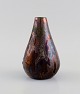 Søren Kongstrand (1872-1951), Denmark. Vase in glazed stoneware. Beautiful 
metallic luster glaze in shades of red. 1920s.
