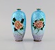Presumably Limoges. A pair of bronze vases with beautiful enamel work with 
flowers. 1930s / 40s.
