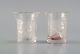 Two early René Lalique Enfants art deco shot glasses in mouth-blown crystal 
glass. 1930s.

