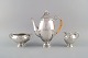 Just Andersen (1884-1943), Denmark. Coffee service in silver (826) with angular 
body and pearl decoration. Coffee pot with bone handle. 1920s.
