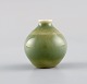 Carl Harry Stålhane for Rörstrand. Miniature vase in glazed ceramics. Beautiful 
glaze in delicate shades of green. Mid-20th century.
