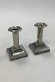 A Pair of hammered candlelight holders made of Pewter