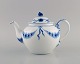 Antique and rare Bing & Grøndahl empire teapot in hand-painted porcelain. Lid 
modeled with snail shell. Late 19th century.
