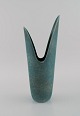 Gunnar Nylund for Rörstrand. Rare vase in glazed ceramics. Beautiful glaze in 
shades of blue-green. Mid-20th century.
