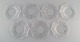 Seven Lalique "Pansies" plates in frosted art glass shaped like flower petals. 
1970s / 80s.
