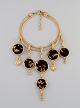Large vintage Yves Saint Laurent "Gold" necklace with five pendants. 1970s / 
80s.
