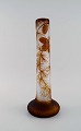 Antique Emile Gallé vase in frosted and light brown art glass carved in the form 
of spruce cones and branches. Early 20th century.
