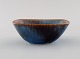 Gunnar Nylund (1904-1997) for Rörstrand. Bowl in glazed ceramics. Beautiful 
glaze in blue and brown shades. Mid-20th century.
