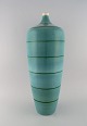 European studio ceramicist. Large floor vase in glazed ceramics. Beautiful glaze 
in turquoise shades. Late 20th century.
