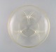 Early René Lalique Volubilis bowl in clear and frosted mouth blown art glass on 
three feet. 1920s.
