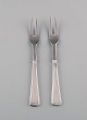 Rare Georg Jensen Koppel cutlery. Two roast forks in sterling silver and 
stainless steel.
