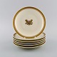 Six Royal Copenhagen Golden Horns porcelain plates. 1960s.
