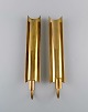 Pierre Forsell for Skultuna. Two Reflex wall candlesticks in brass. Swedish 
design, 1960s.
