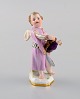 Meissen, Germany. Antique hand-painted porcelain figure. Putti. Approx. 1900.
