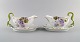 Rosenthal, Germany. Two Iris sauce boats in hand-painted porcelain with flowers 
and gold edge. Handles modeled as foliage. 1920s.
