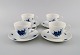 Bjørn Wiinblad for Rosenthal. Four Romanze Blue Flower coffee cups with saucers. 
1960s.
