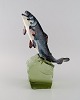 Swedish designer. Fish in glazed ceramics on mouth-blown art glass base. 1960