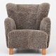 Roxy Klassik presents: Dansk SnedkermesterReupholstered easy chair in new lambskin (Sahara 07) with beech ...