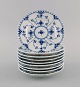 Nine Royal Copenhagen Blue Fluted Full Lace plates in porcelain. Model number 
1/1088.
