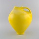 Francis Milici (b. 1952) for Vallauris. Large organically shaped unique pitcher 
in glazed ceramics. Beautiful glaze in yellow shades. Dated 1998.
