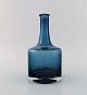 Åseda Glasbruk, Sweden. Narrow neck vase in blue mouth blown art glass. 1970s.
