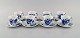 Eight Royal Copenhagen Blue flower Curved espresso cups with saucers. Model 
number 10/1546.
