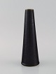 Carl Harry Stålhane (1920-1990) for Rörstrand. Cone-shaped vase in glazed 
ceramics. Beautiful speckled glaze in dark and metallic shades. Mid-20th 
century.
