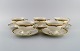 KPM, Berlin. Five Royal Ivory teacups with saucers in cream-colored porcelain 
with gold decoration. 1920s.
