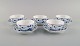 Five rare and antique Royal Copenhagen Blue Fluted Plain teacups with saucers. 
Late 19th century. Model number 1/88.
