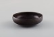 Eva Stæhr-Nielsen for Saxbo. Miniature bowl in glazed ceramics. Beautiful glaze 
in brown shades. Mid-20th century.
