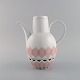 Bjørn Wiinblad for Rosenthal. Lotus porcelain service. Coffee pot with heater 
for tealight candles decorated with pink lotus leaves. 1980s.

