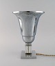 Table lamp in aluminum and clear art glass. French design, 1940s.
