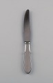 Gundorph Albertus for Georg Jensen. Mitra lunch knife in stainless steel. 1970s. 
Eight pieces in stock.
