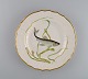 Royal Copenhagen middagstallerken i porcelæn med håndmalet fiskemotiv og 
guldkant. Flora / Fauna Danica stil. Dateret 1968.
