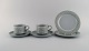 Jens H. Quistgaard (1919-2008) for Bing & Grøndahl / Nissen Kronjyden. Two Gray 
Cordial teacups with saucers and two plates in glazed stoneware. 1960s.
