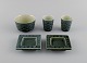 Jens H. Quistgaard (1919-2008) for Nissen Kronjyden. Azur bowl, two egg cups and 
two small dishes in glazed stoneware. 1960s.
