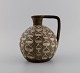 Axel Brüel (1900-1977), Danish ceramicist. Unique jug in glazed stoneware 
decorated with drops. Mid-20th century.
