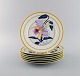 Porcelaine de Paris. "Aurore Tropicale". Six porcelain lunch plates decorated 
with flowers and bamboo. 1980s.
