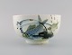 Nils Thorsson for Royal Copenhagen. Bowl in glazed faience with fish motifs. 
1970