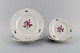 Fire Meissen Pink Rose tallerkener i gennembrudt porcelæn med håndmalede roser 
og guldkant. Tidligt 1900-tallet.
