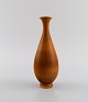 Berndt Friberg (1899-1981) for Gustavsberg Studiohand. Vase i glaseret keramik. 
Smuk glasur i brune nuancer. Dateret 1964.
