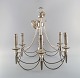 Six-armed chandelier in silver plate. Classic style. 1930