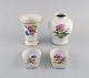 Meissen, Tyskland. To vaser og to små skåle i håndmalet porcelæn med blomster og 
guldkant. Tidligt 1900-tallet.
