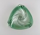Murano bowl in green mouth-blown art glass. Curved design. Italy, 1980s.
