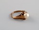 Scandinavian goldsmith. Vintage ring in 14 carat gold adorned with cultured 
pearl. Mid 20th century.

