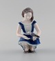 Bing & Grøndahl porcelain figure. Girl with dove. Model number 2340.
